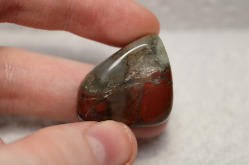 Polished milky red and green stones.